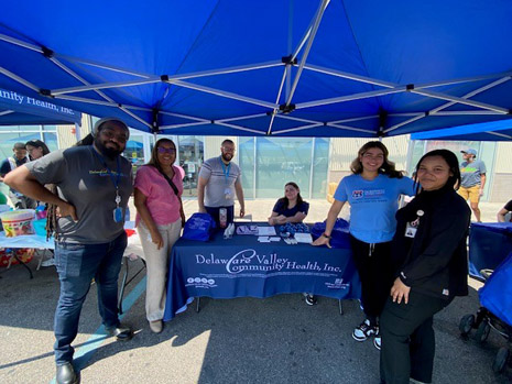 Left to right: Mark Stewart, Director of Government Affairs and Executive Liaison, Delaware Valley Community Health; Rhonda Jackson, HRSA IEA; Delaware Valley Community Health interns and staff members