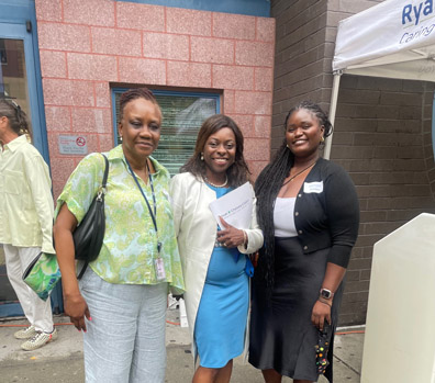 Left to right: Octavia Wisseh, HRSA IEA; Sarina Jean-Louis, Executive Director, Ryan Chelsea-Clinton Health Center; Sockna Cisse, HRSA IEA