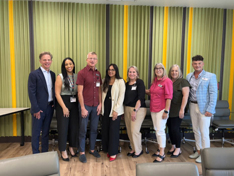 Left to Right: David Brinkman, Chief Executive Officer; Corina Velasquez, Chief Operating Officer; William VanHemert, Director of Institutional Giving; Abjot Kaur, HRSA IEA; Judy Stith, Chief Administrative Officer; Sheri Saenz, Chief People & Places Officer; Stephanie Smith, Associate Director of Institutional Giving; and CJ Tobe, Chief Transformation Officer