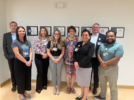 Left to Right: Robert Warzecha, Chief Information Officer; Christine Mazhary, Human Resources Director; Erin Segovia, Chief Nursing Officer; Anne Huang, HRSA IEA; Guadalupe (Lupe), Chief Executive Officer; Jason Carey, Chief Financial Officer; and Jared Chimil, Community Outreach Coordinator