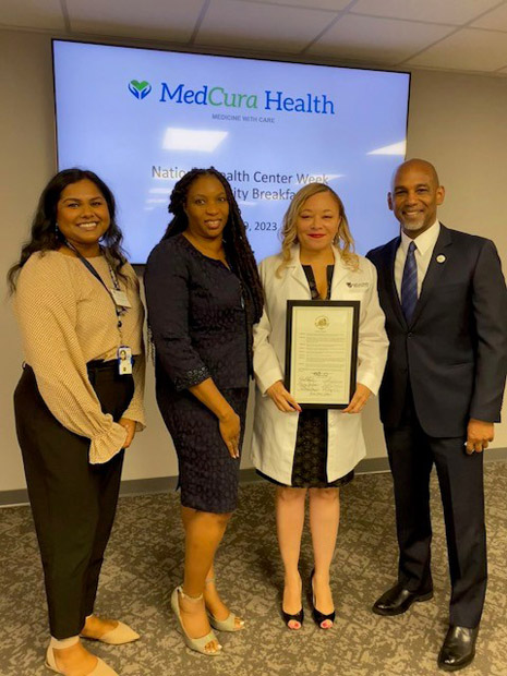 Left to Right: Priya Shah, Public Health Analyst; Charmaine Willis, Director of Nursing; Dr. Raulniña Uzzle, Chief Medical Officer; Jeff Taylor, Chief Executive Officer.