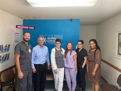 Left to Right: Matthew Husky, Advanced Practice Registered Nurse; Tony Calandro, Chief Executive Officer; Administration Staff; T'Ronda Flagg, HRSA IEA Deputy Regional Administrator