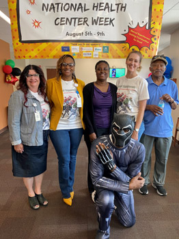 Left to Right: Barbara Zak, Chief Strategy Officer; Candice Cole-Smith, CEO; Curtizia Alexander, HRSA IEA; Jess Hughes, Fund Development Director; Antamond Beck, Building Maintenance Technician; and John Granbury, Board Member