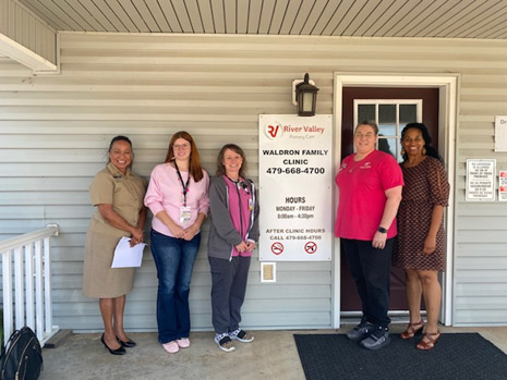 Left to Right: LCDR Amy Eden, HRSA IEA; Nikki McKinney, HR Director; April Revis, Advanced Practice Registered Nurse; Administration staff; T'Ronda Flagg, HRSA IEA Deputy Regional Administrator