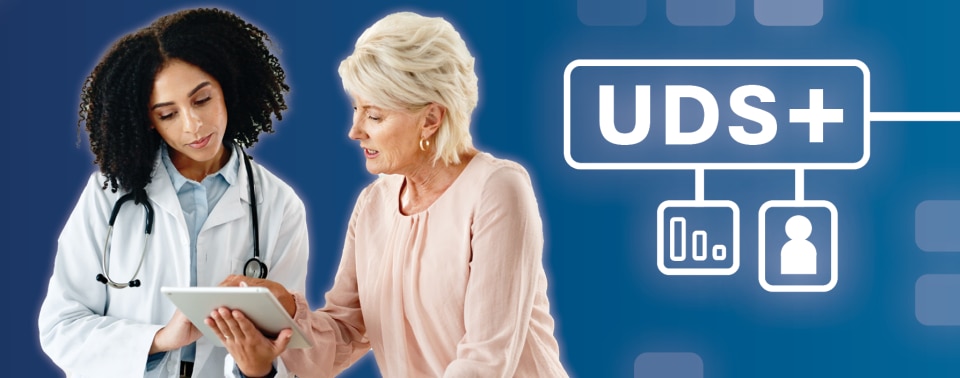 A doctor looks at a tablet with a woman. Text reads, "UDS+"